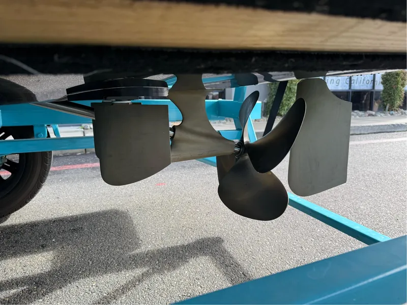 Slide: The Image of 2019 MasterCraft X24 propeller and rudder on a trailer, showcasing marine engineering. - 34