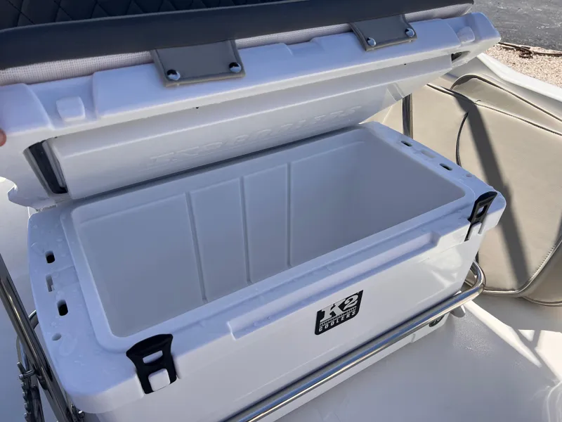 Slide: The Image of Open cooler on 2025 Key West 1720 Center Console boat, ready for storage. - 16