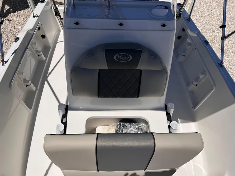 Slide: The Image of 2025 Key West 1720 Center Console boat interior with seating and storage. - 21