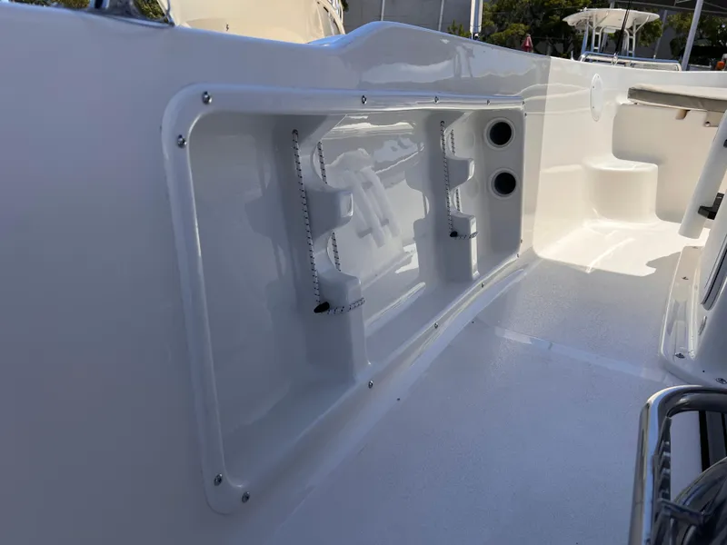 Slide: The Image of 2025 Key West 1720 Center Console boat interior detail, featuring storage compartments and sleek design. - 27