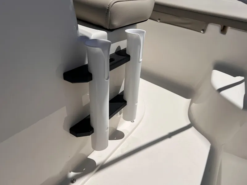 Slide: The Image of 2025 Key West 1720 Center Console boat rod holders and seating detail. - 29
