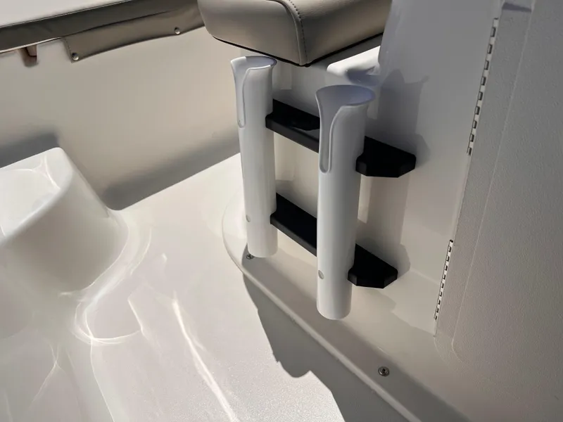 Slide: The Image of 2025 Key West 1720 Center Console boat interior with rod holders and seating. - 30