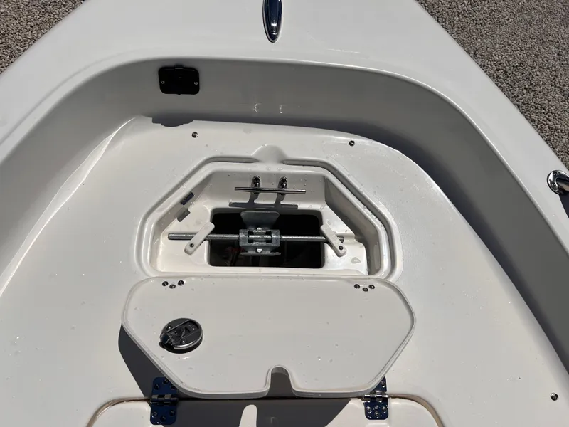 Slide: The Image of 2025 Key West 1720 Center Console boat deck with storage compartment open. - 31