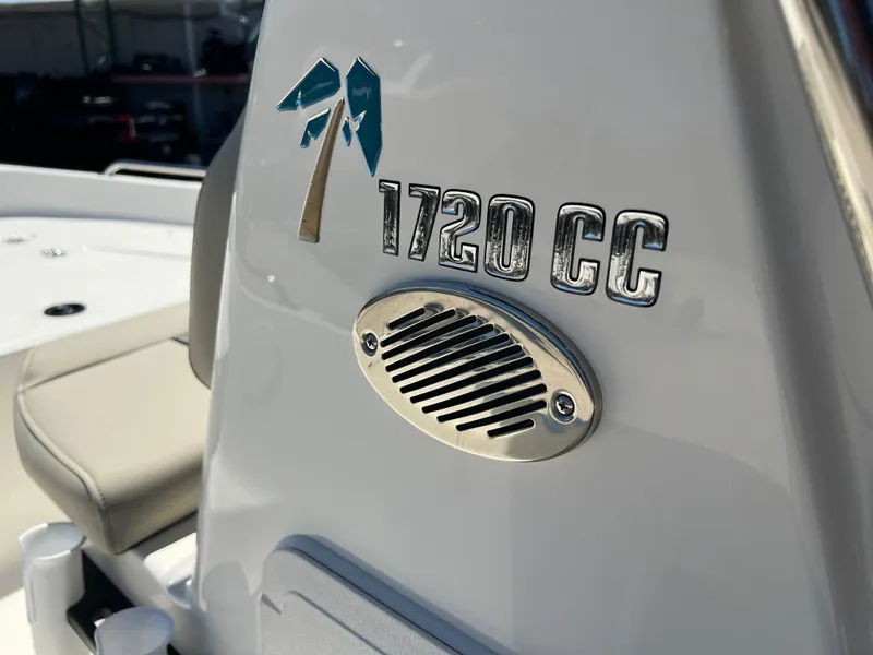 Slide: The Image of 2025 Key West 1720 Center Console boat with logo and speaker detail. - 34