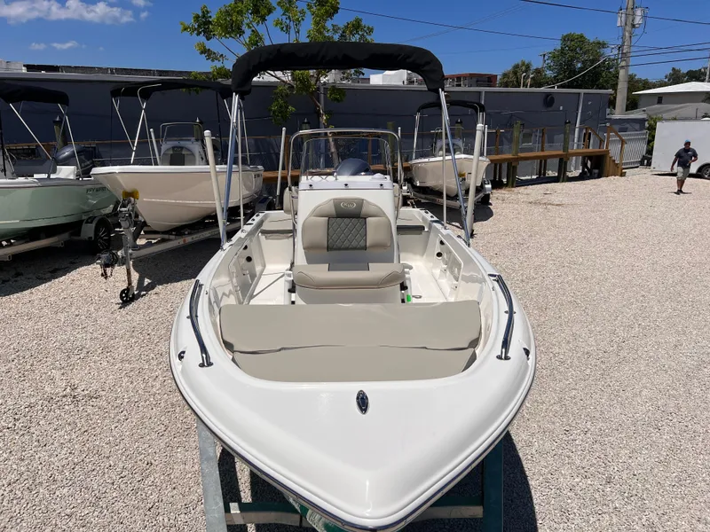 Slide: The Image of 2025 Key West 1720 Center Console boat displayed outdoors on gravel lot. - 5