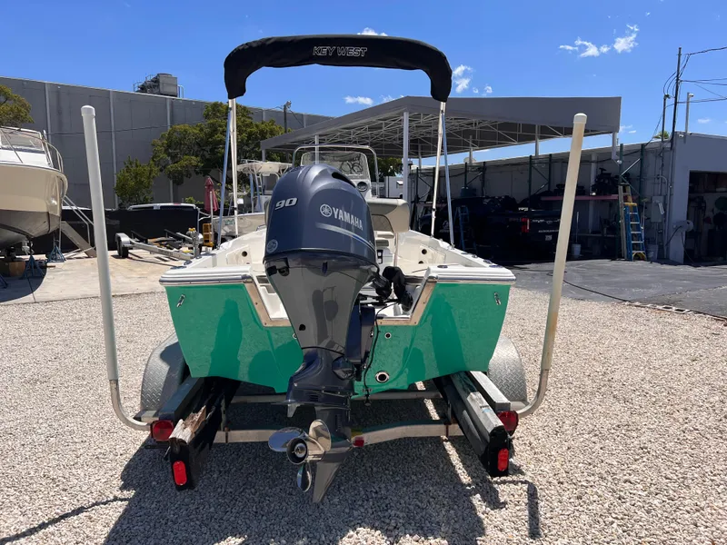 Slide: The Image of 2025 Key West 1720 Center Console boat with Yamaha engine on trailer. - 7