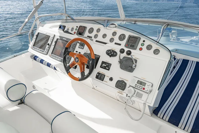 Slide: The Image of Cockpit of 2002 Fairline Squadron 58 yacht with modern navigation instruments. - 20