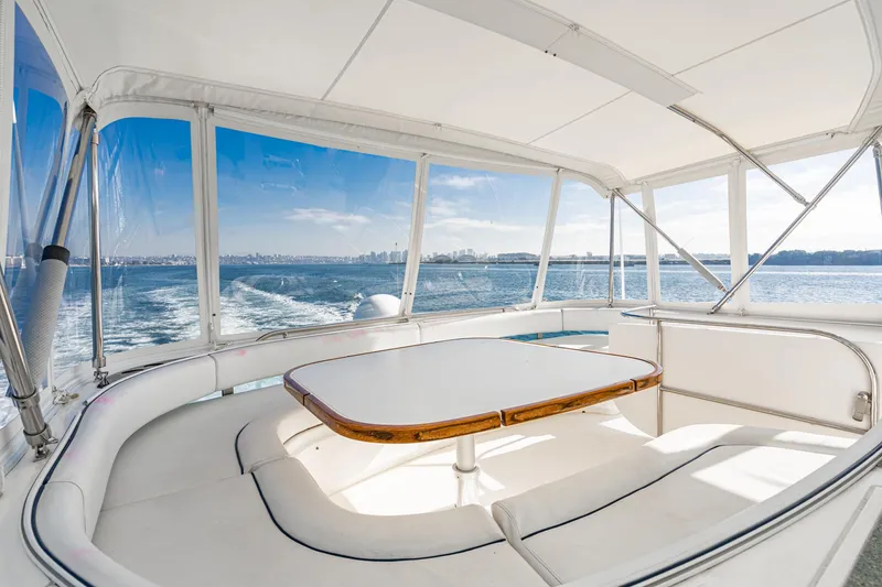Slide: The Image of Luxurious 2002 Fairline Squadron 58 yacht interior with panoramic ocean views. - 28