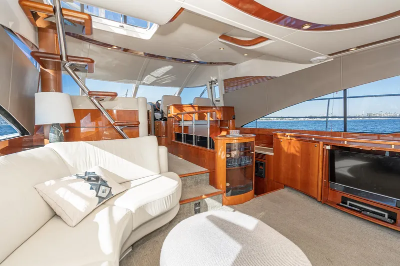 Slide: The Image of Luxurious interior of 2002 Fairline Squadron 58 yacht with elegant wood finishes and modern amenities. - 38