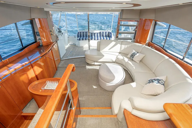 Slide: The Image of Luxurious interior of 2002 Fairline Squadron 58 yacht with elegant seating and ocean view. - 39