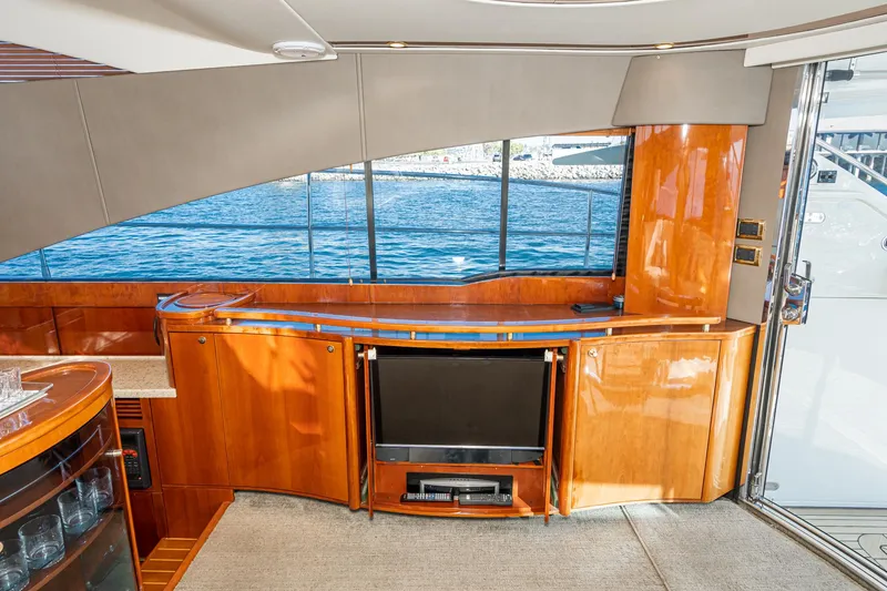 Slide: The Image of Luxurious interior of 2002 Fairline Squadron 58 yacht with wood finish and ocean view. - 41