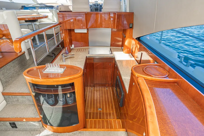 Slide: The Image of Luxurious interior of 2002 Fairline Squadron 58 yacht with polished wood finishes. - 43