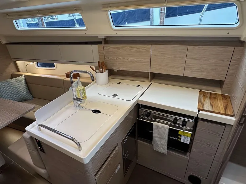 Slide: The Image of Modern kitchen interior of 2019 Hanse 348 yacht with sleek cabinetry and appliances. - 49