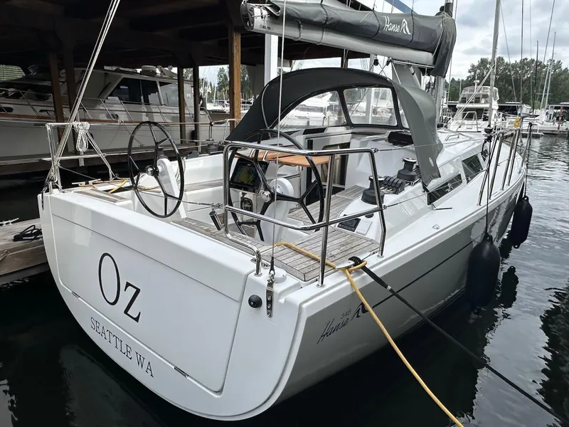 Slide: The Image of 2019 Hanse 348 sailboat docked in Seattle marina, featuring sleek design and modern amenities. - 5