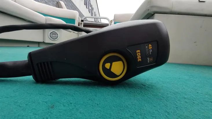 Slide: The Image of Control panel on a 2006 SunChaser 825F boat, featuring a black and yellow design. - 3