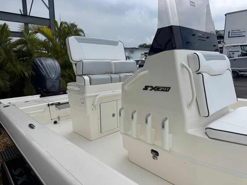 Slide: The Image of 2025 Skeeter SX 241 boat interior with seating and console, showcasing modern design and features. - 9