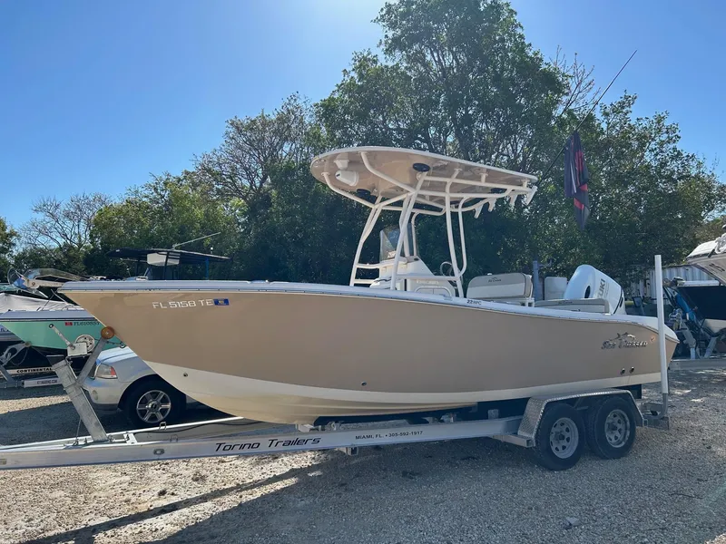 The Image of 2022 Sea Chaser 22 HFC boat on trailer, parked outdoors. - 1