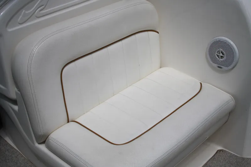 Slide: The Image of White leather seat on 2000 Sea Ray 290 Sundancer boat with speaker. - 5
