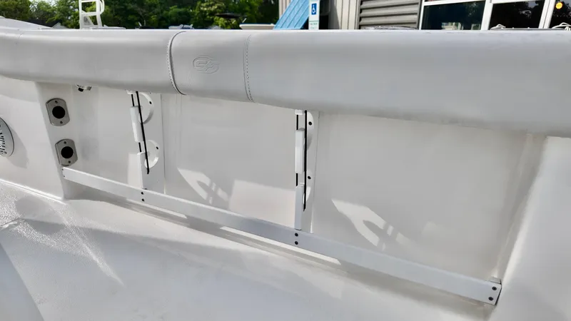 Slide: The Image of 2020 Sea Fox 248 Commander boat interior detail with white seating and storage compartments. - 11