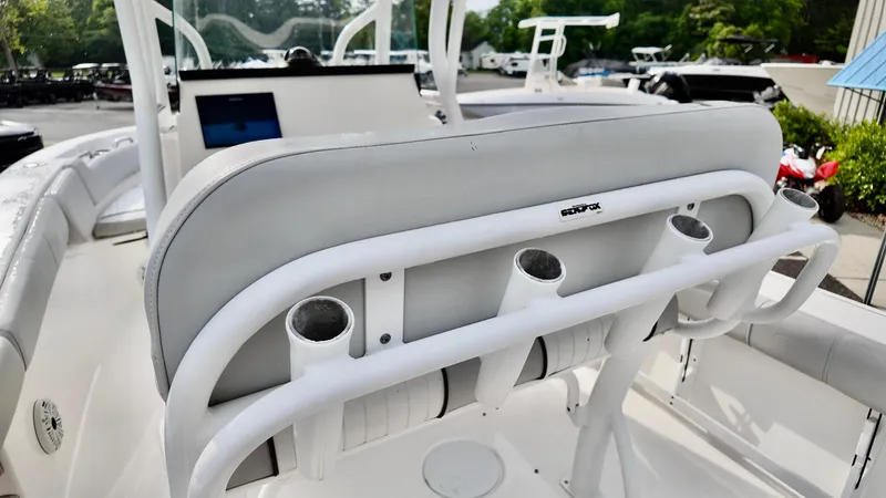 Slide: The Image of 2020 Sea Fox 248 Commander boat interior with rod holders and seating. - 12