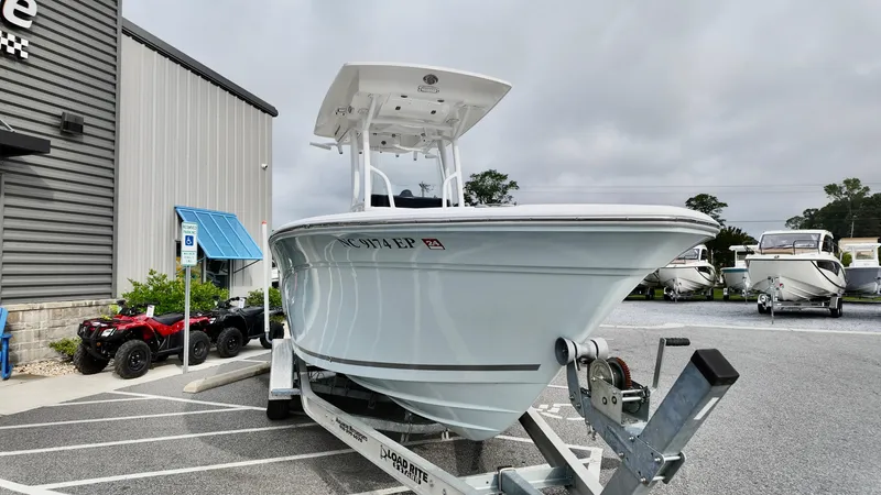 Slide: The Image of 2020 Sea Fox 248 Commander boat on trailer in parking lot. - 3
