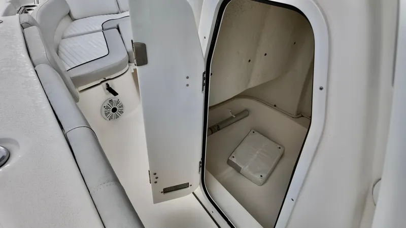 Slide: The Image of 2020 Sea Fox 248 Commander boat interior with open storage compartment and seating area. - 6