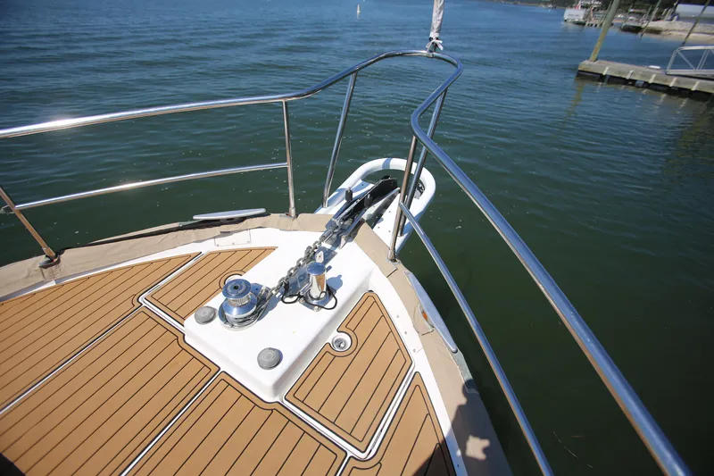 Slide: The Image of Bow of 2007 Beneteau Swift Trawler 42 with anchor and teak decking. - 7