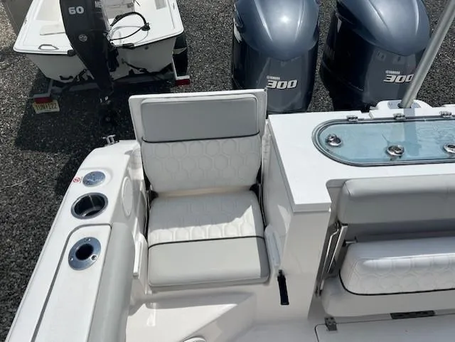 Slide: The Image of 2020 Sea Fox 288 Commander boat interior with seating and dual Yamaha 300 engines. - 10