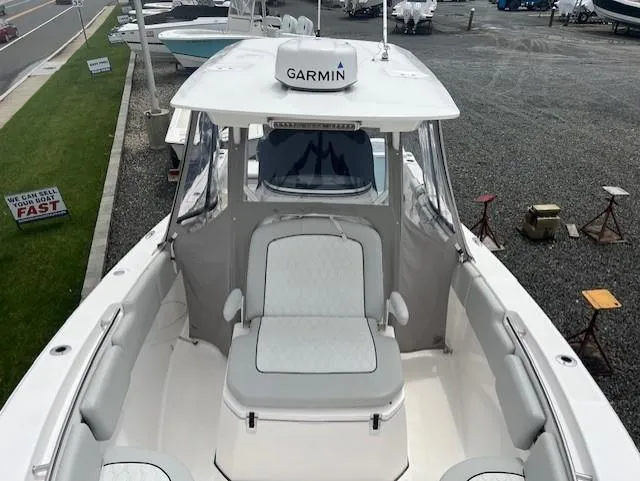 Slide: The Image of 2020 Sea Fox 288 Commander boat with Garmin equipment, docked in a marina. - 15