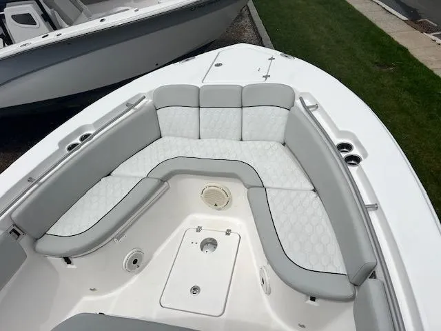 Slide: The Image of 2020 Sea Fox 288 Commander boat with spacious, cushioned seating area. - 16