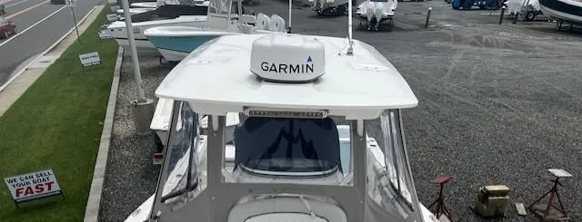 Slide: The Image of 2020 Sea Fox 288 Commander boat with Garmin equipment, parked in a marina. - 17