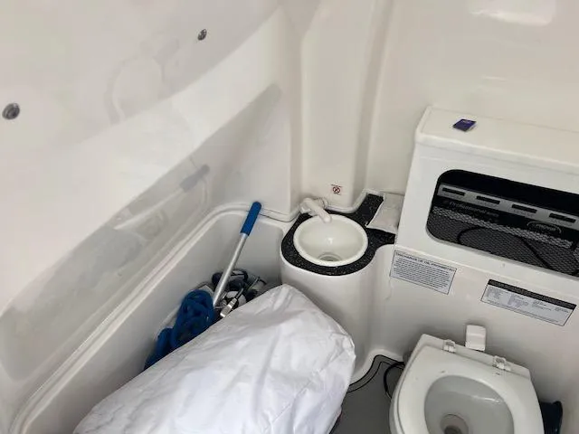 Slide: The Image of Interior of 2020 Sea Fox 288 Commander boat with toilet and sink. - 18