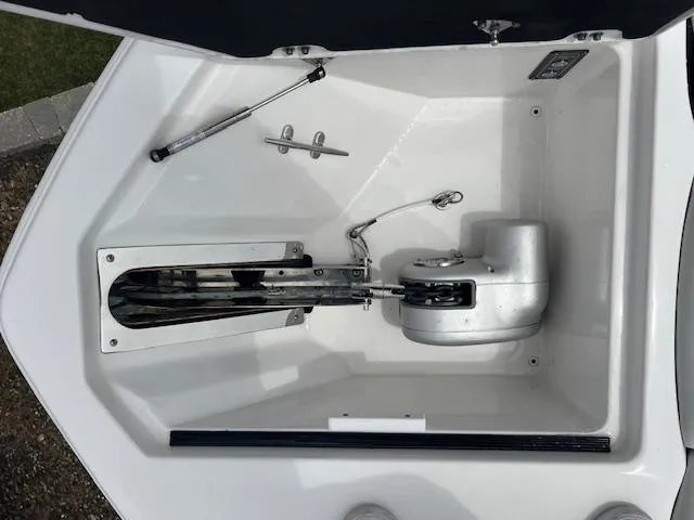 Slide: The Image of 2020 Sea Fox 288 Commander anchor compartment with winch and cleat. - 20