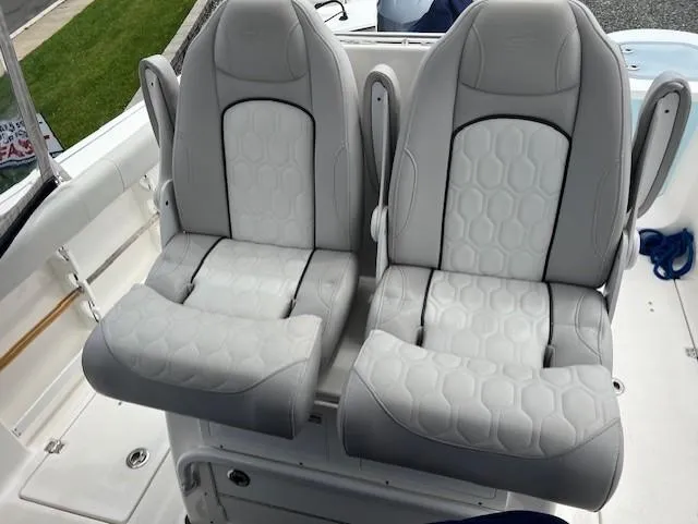 Slide: The Image of 2020 Sea Fox 288 Commander boat seats with gray upholstery and modern design. - 6