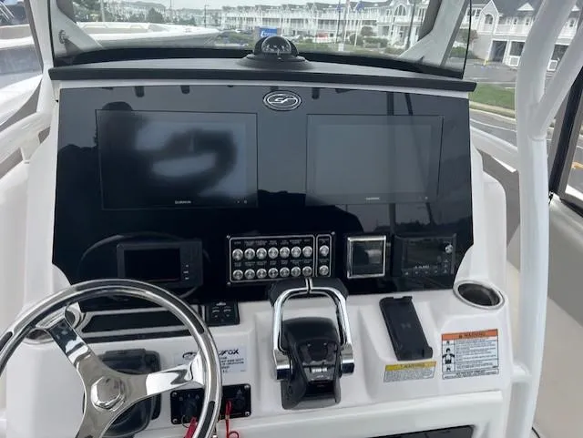 Slide: The Image of 2020 Sea Fox 288 Commander dashboard with dual screens and controls. - 9