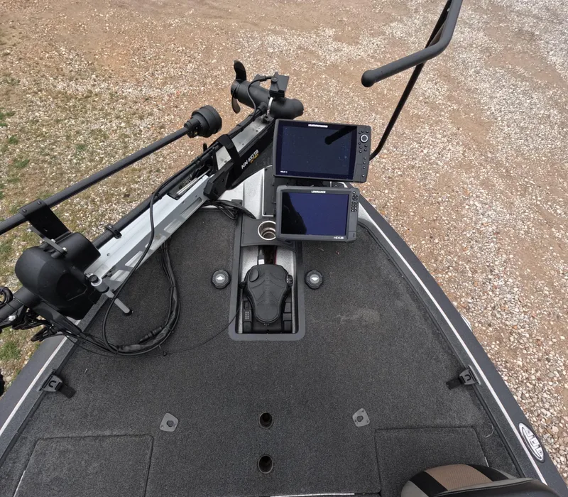 Slide: The Image of 2014 Ranger Z521C Comanche boat deck with electronics and trolling motor. - 2