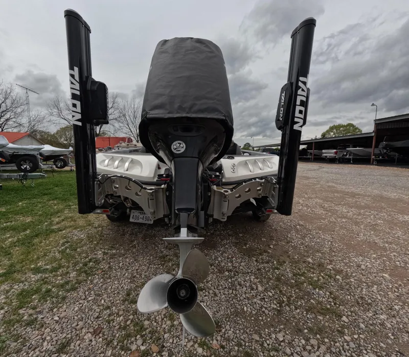 Slide: The Image of 2014 Ranger Z521C Comanche boat with Talon anchors, rear view on gravel surface. - 9
