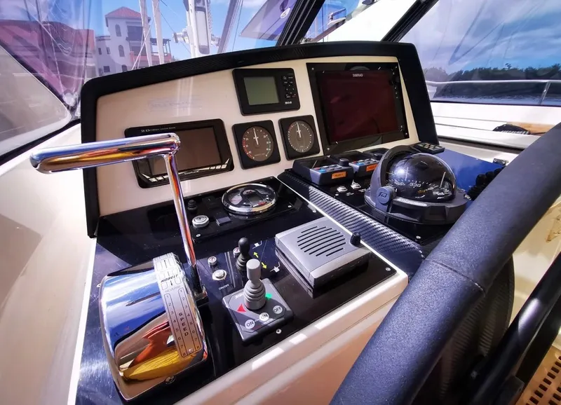 Slide: The Image of Cockpit of 2012 Amel 55 yacht with navigation instruments and controls. - 3