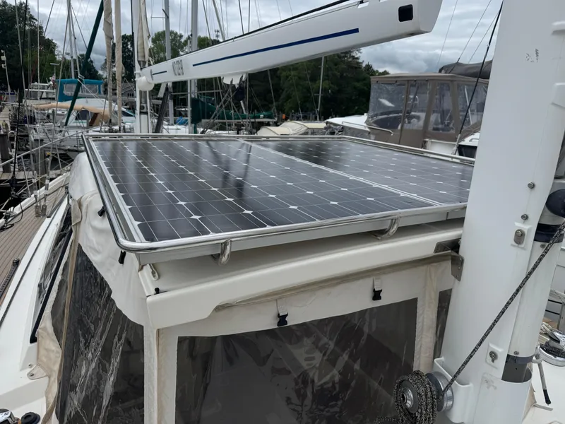 Slide: The Image of Sailboat with solar panels, Amel 55 model, 2012, docked at marina. - 30