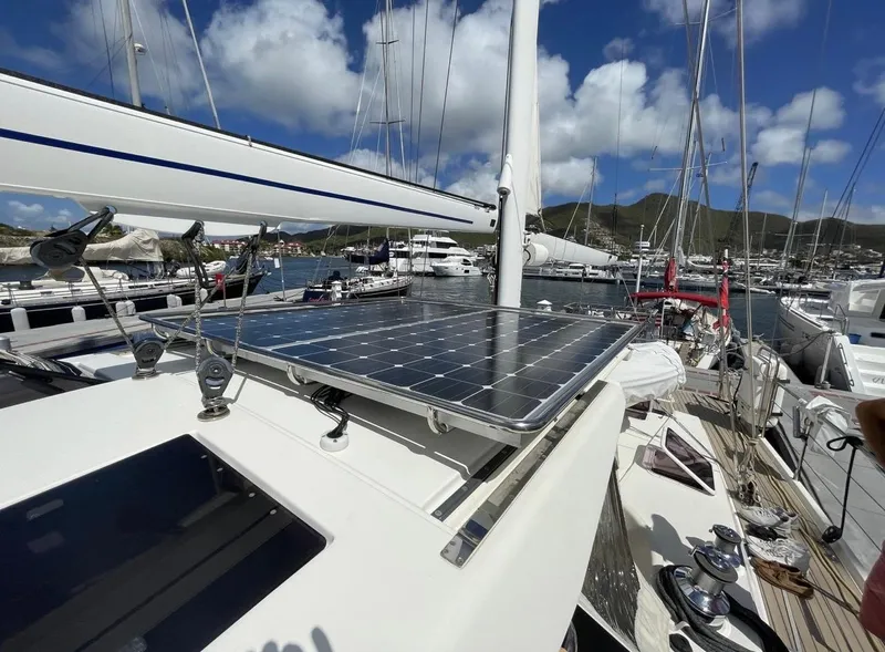 Slide: The Image of Sailboat with solar panels docked in marina, Amel 55, 2012 model. - 31