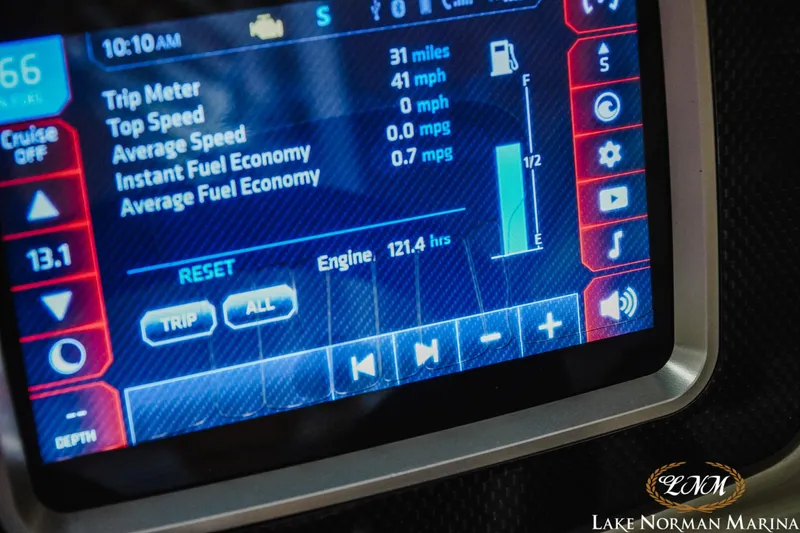 Slide: The Image of Touchscreen display of a 2018 Chaparral 21 Surf boat showing trip and fuel data. - 20