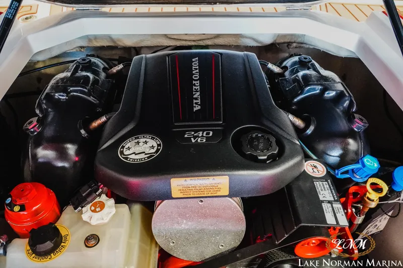 Slide: The Image of Volvo Penta 240 V6 engine in 2018 Chaparral 21 Surf boat at Lake Norman Marina. - 21
