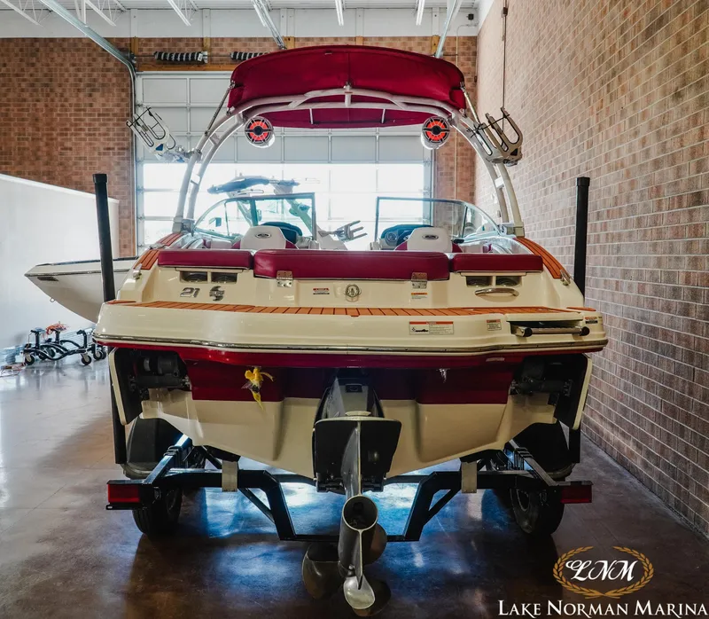 Slide: The Image of 2018 Chaparral 21 Surf boat in showroom at Lake Norman Marina. - 6