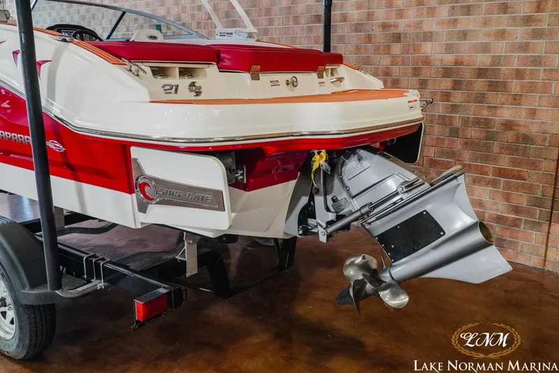 Slide: The Image of 2018 Chaparral 21 Surf boat rear view with propeller, displayed at Lake Norman Marina. - 7