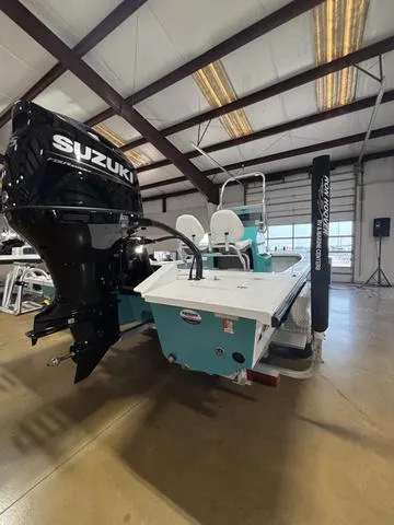 Slide: The Image of 2024 Majek 2206 Illusion boat with Suzuki engine in a showroom. - 6