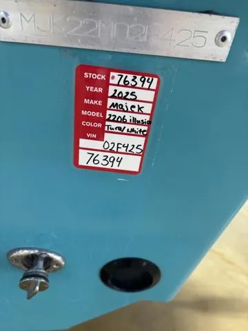 Slide: The Image of Majek 2206 Illusion 2024 model, turquoise exterior, stock and VIN details visible. - 7