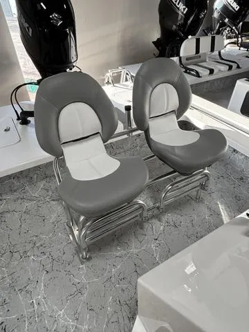 Slide: The Image of Majek 2206 Illusion 2025 boat seats with sleek gray and white design. - 5