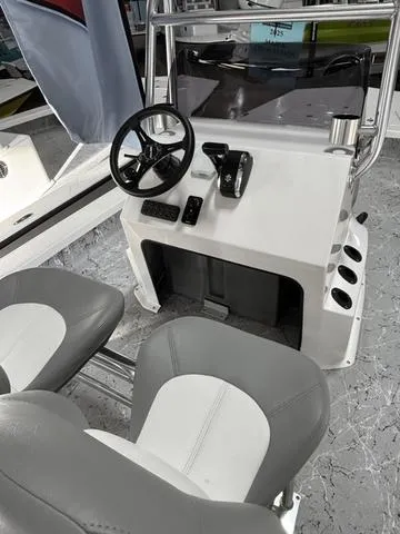 Slide: The Image of 2025 Majek 2206 Illusion boat console with steering wheel and controls. - 6
