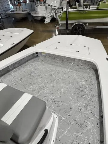 Slide: The Image of 2025 Majek 2206 Illusion boat interior with gray marble-patterned flooring and cushioned seating. - 7