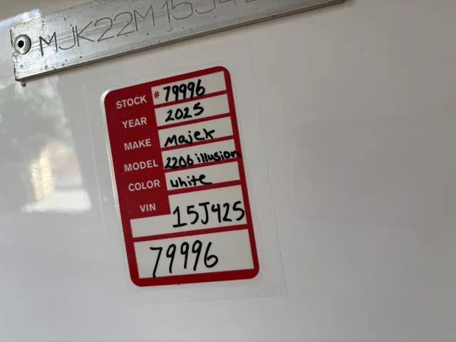 Slide: The Image of Sticker displaying details of a 2025 Majek 2206 Illusion, white color, stock number 79996. - 8